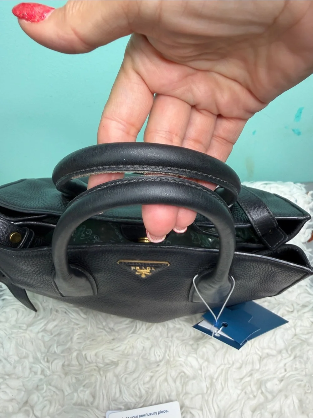 Authentic Prada Black  Leather Satchel with Gold Logo .